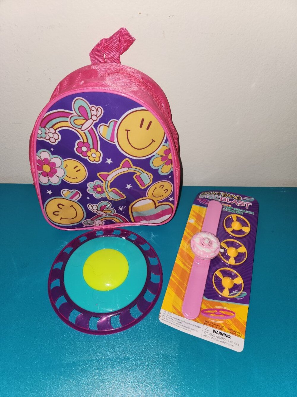 NEW Emoji Mini Backpack with NEW Flying Disc & Snap Band Disc Blast Toy Set